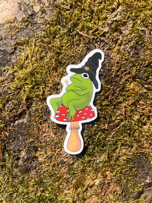 Wizard frog sticker sitting on a toadstool